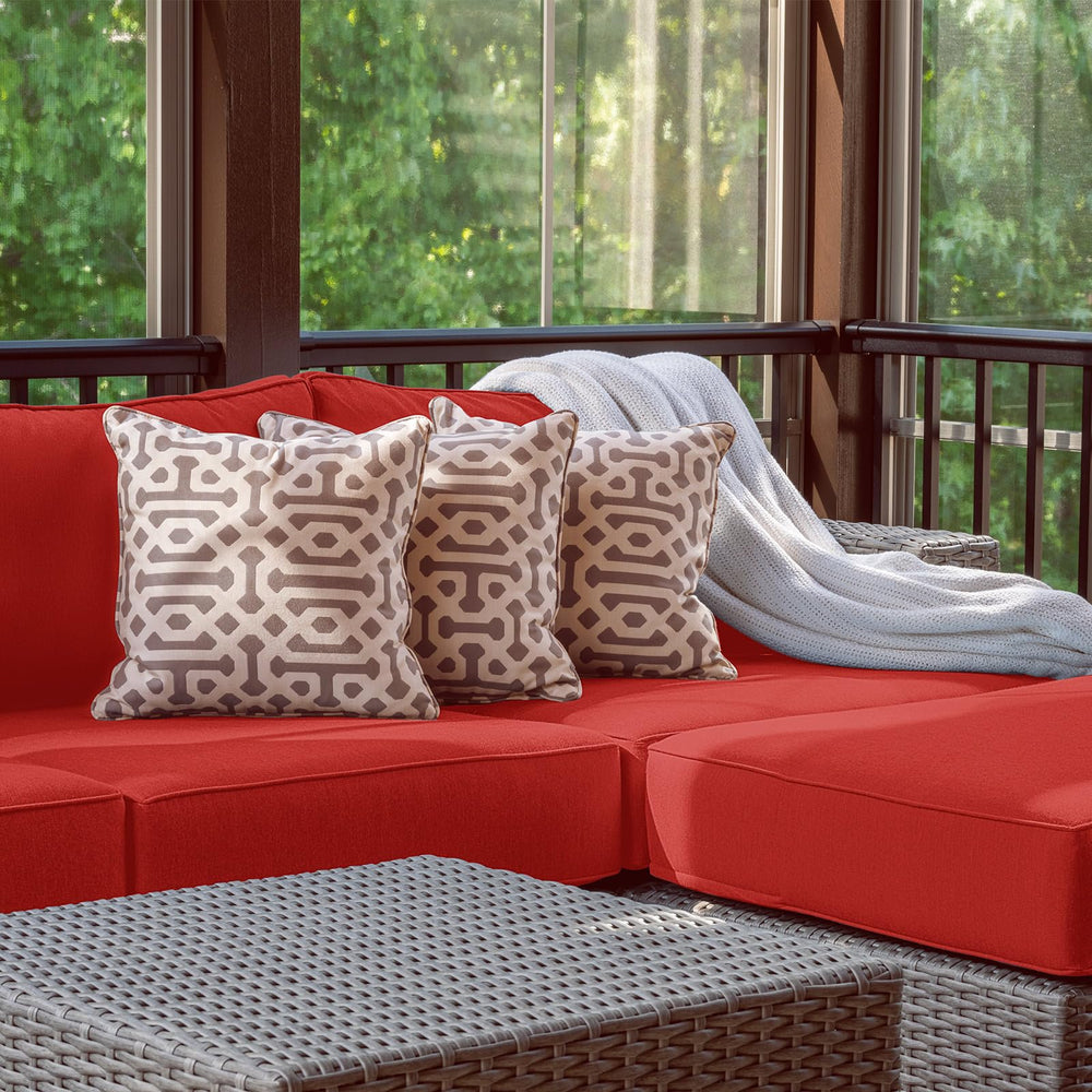 Patelai lifestyle patio scene with red covers creating vibrant coordinated seating benefit