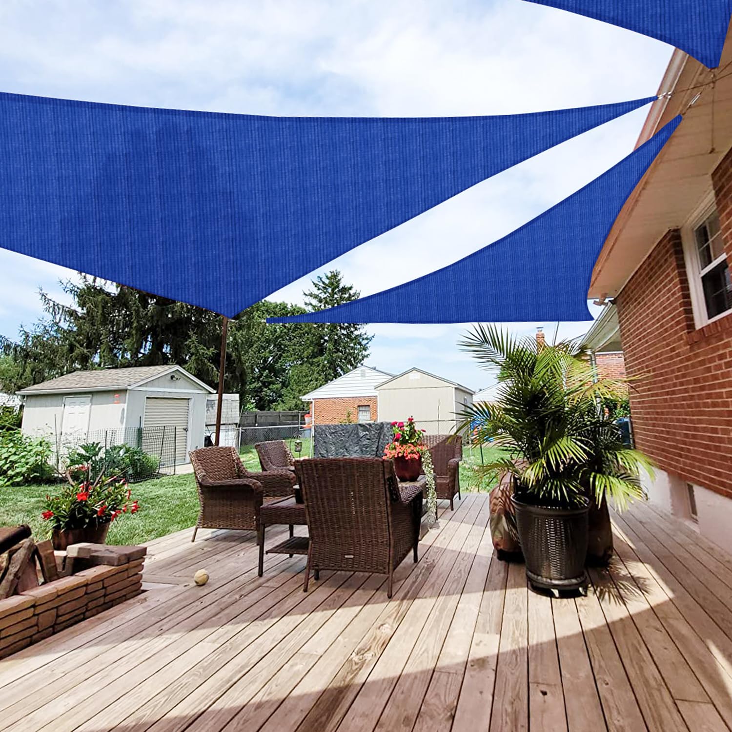 Patio Paradise front view of blue triangle canopy showing full coverage and shade benefit