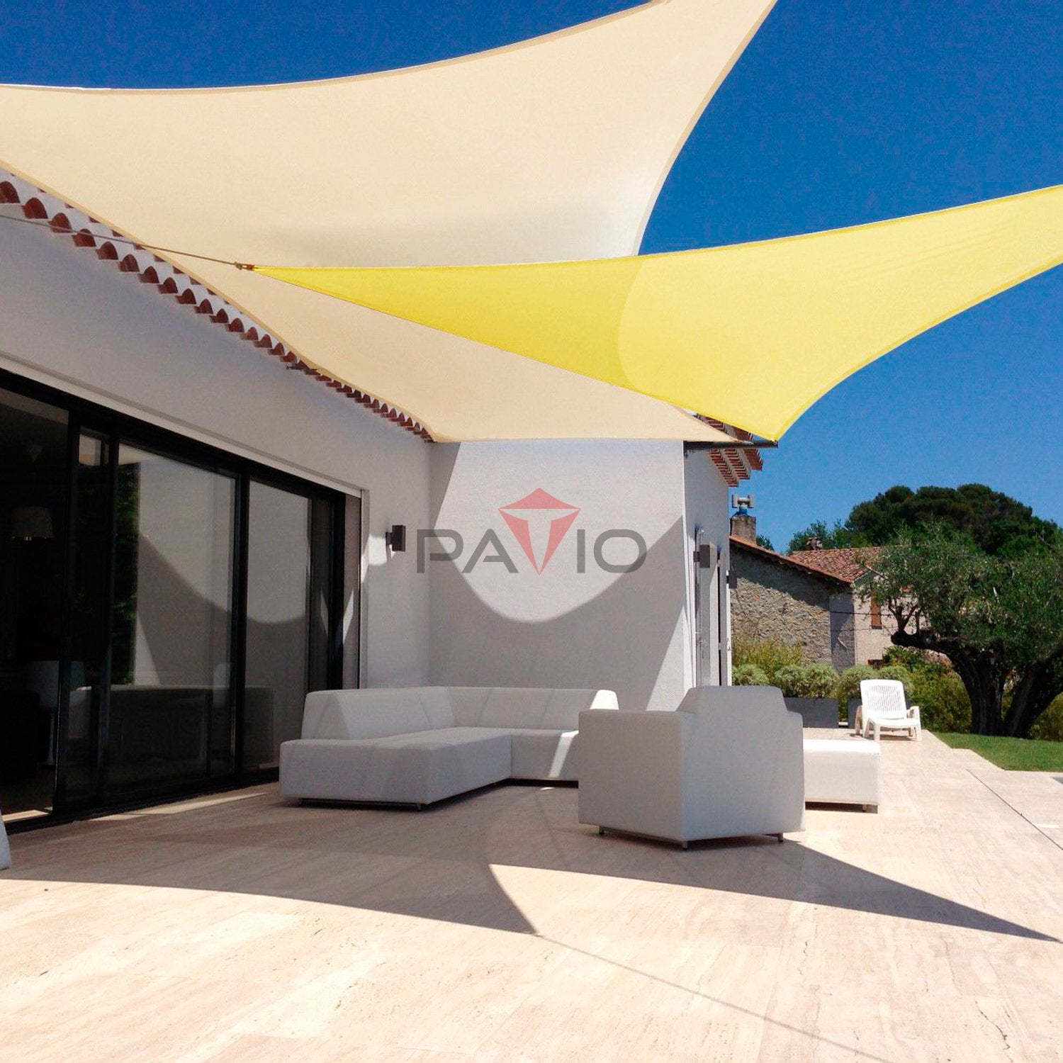 Patio shade installed over patio creating cool, ventilated outdoor lounging area