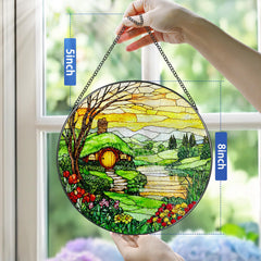 Pauyadu suncatcher held in hand to show eight-inch scale and easy placement benefit
