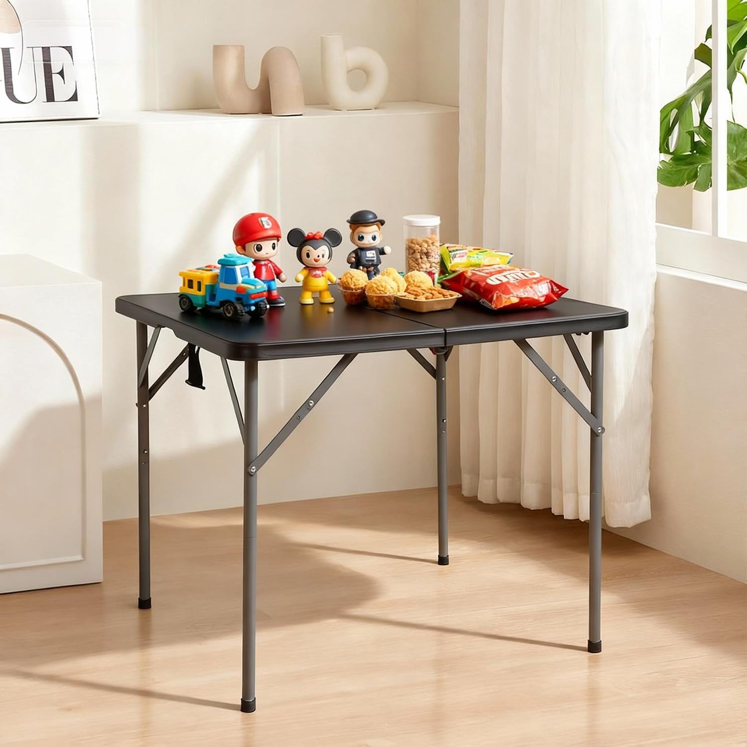 Pazidom folded table with handle showing portable carry and storage benefit