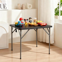 Pazidom folded table with handle showing portable carry and storage benefit