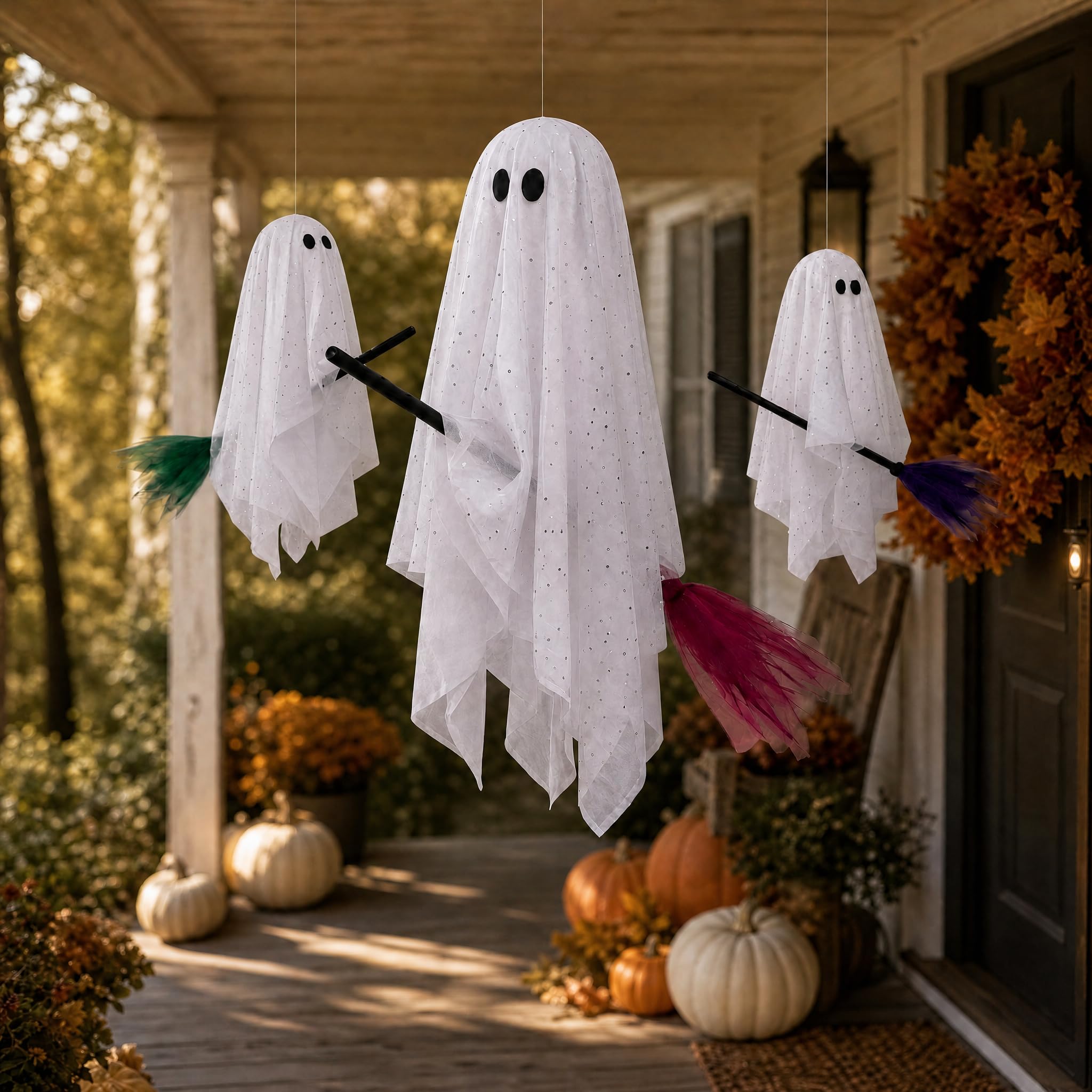 PEJOURI porch at night with illuminated ghosts creating welcoming Halloween ambience