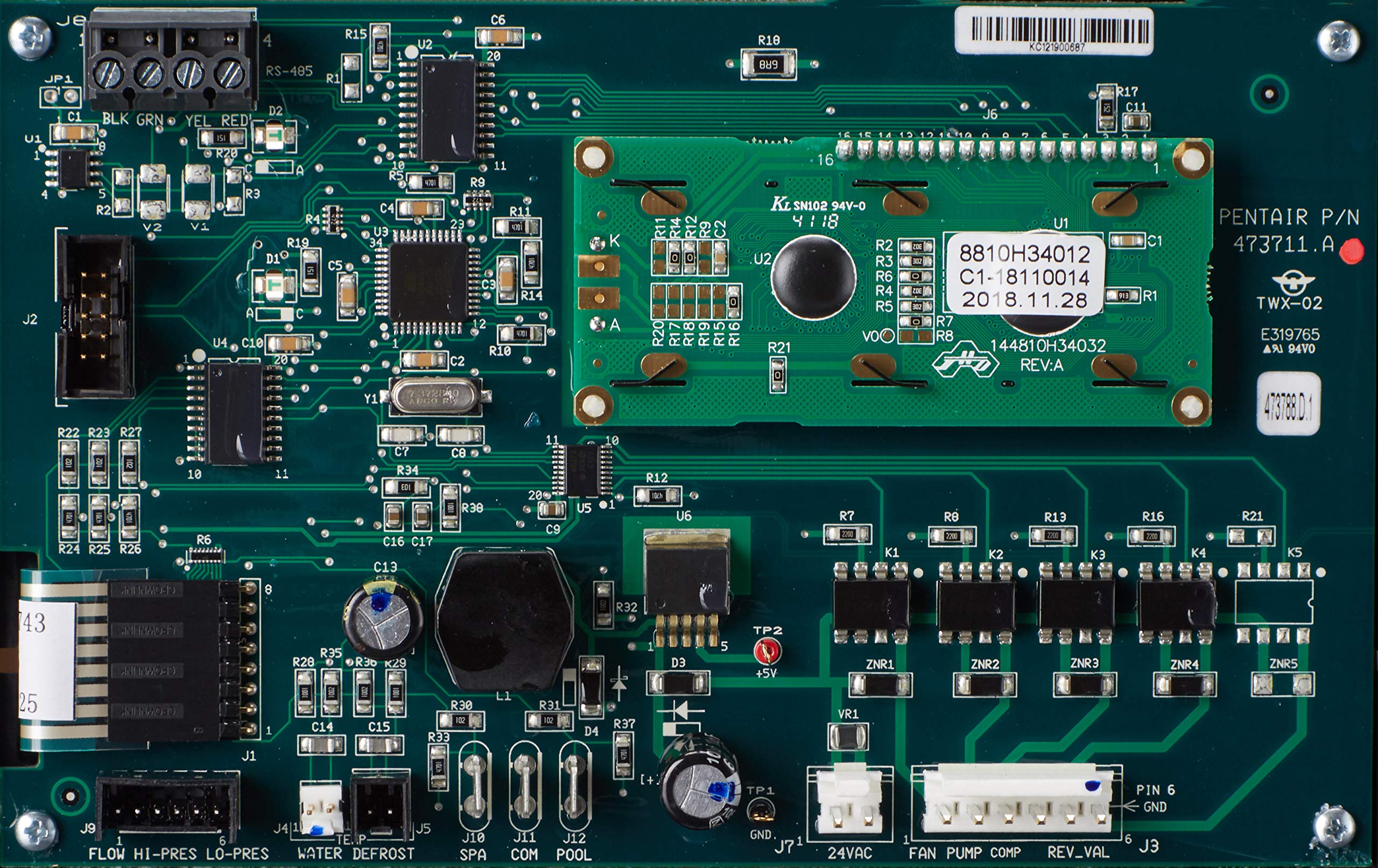 Pentair control board size comparison next to coin showing compact footprint for service planning