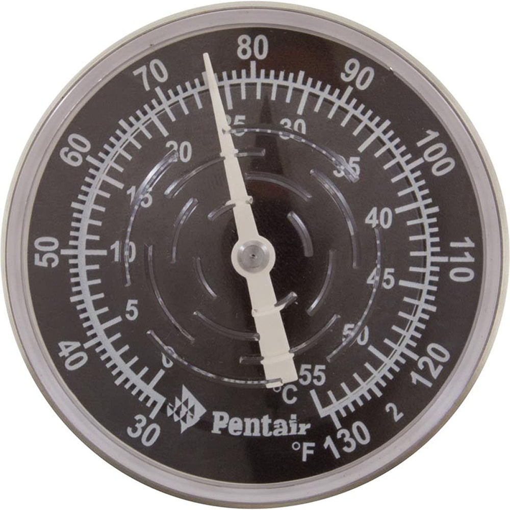 Pentair thermometer beside tape measure showing compact 0.5 inch dimensions for tight spaces