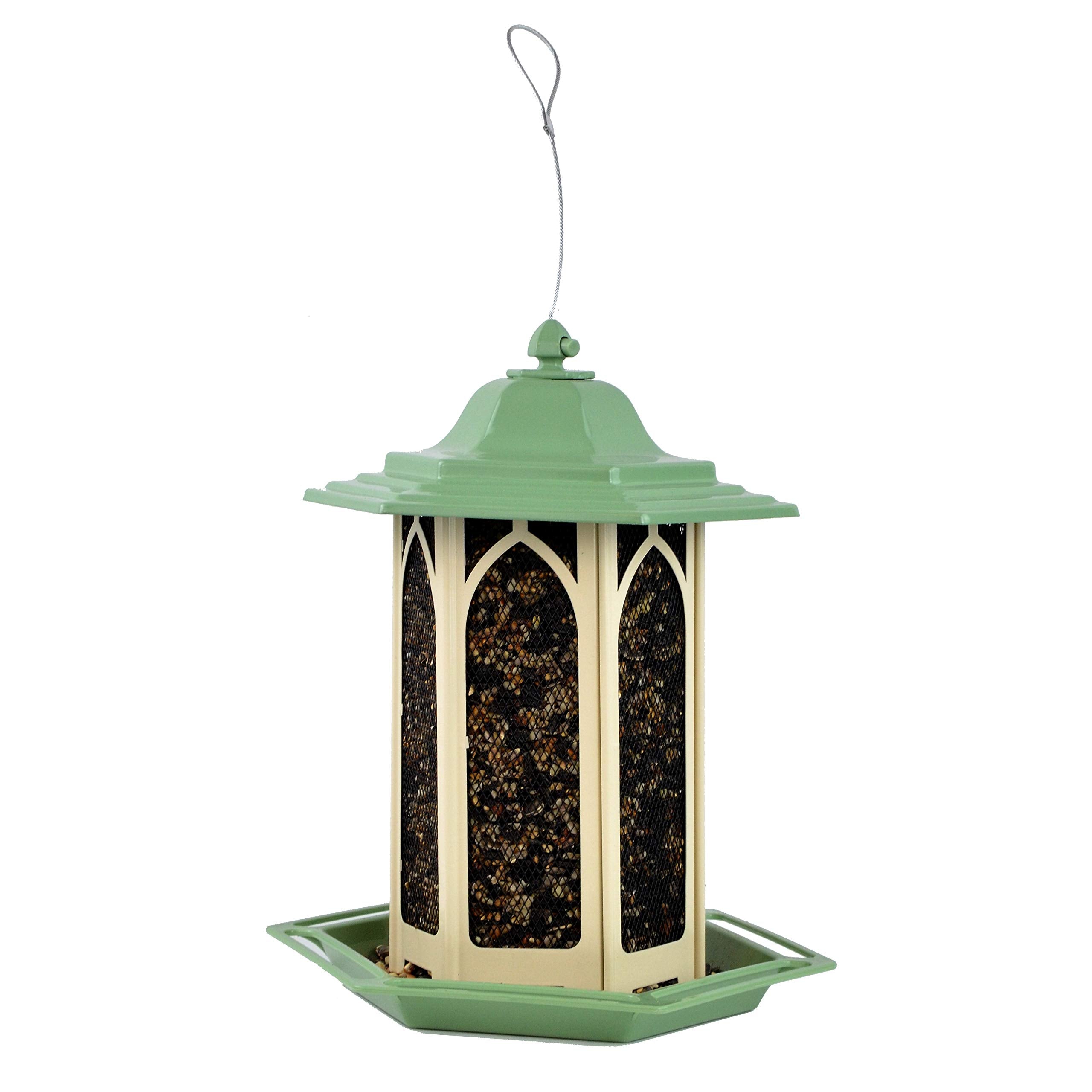 Perky-Pet pistachio installed in garden inviting songbirds in a backyard setting