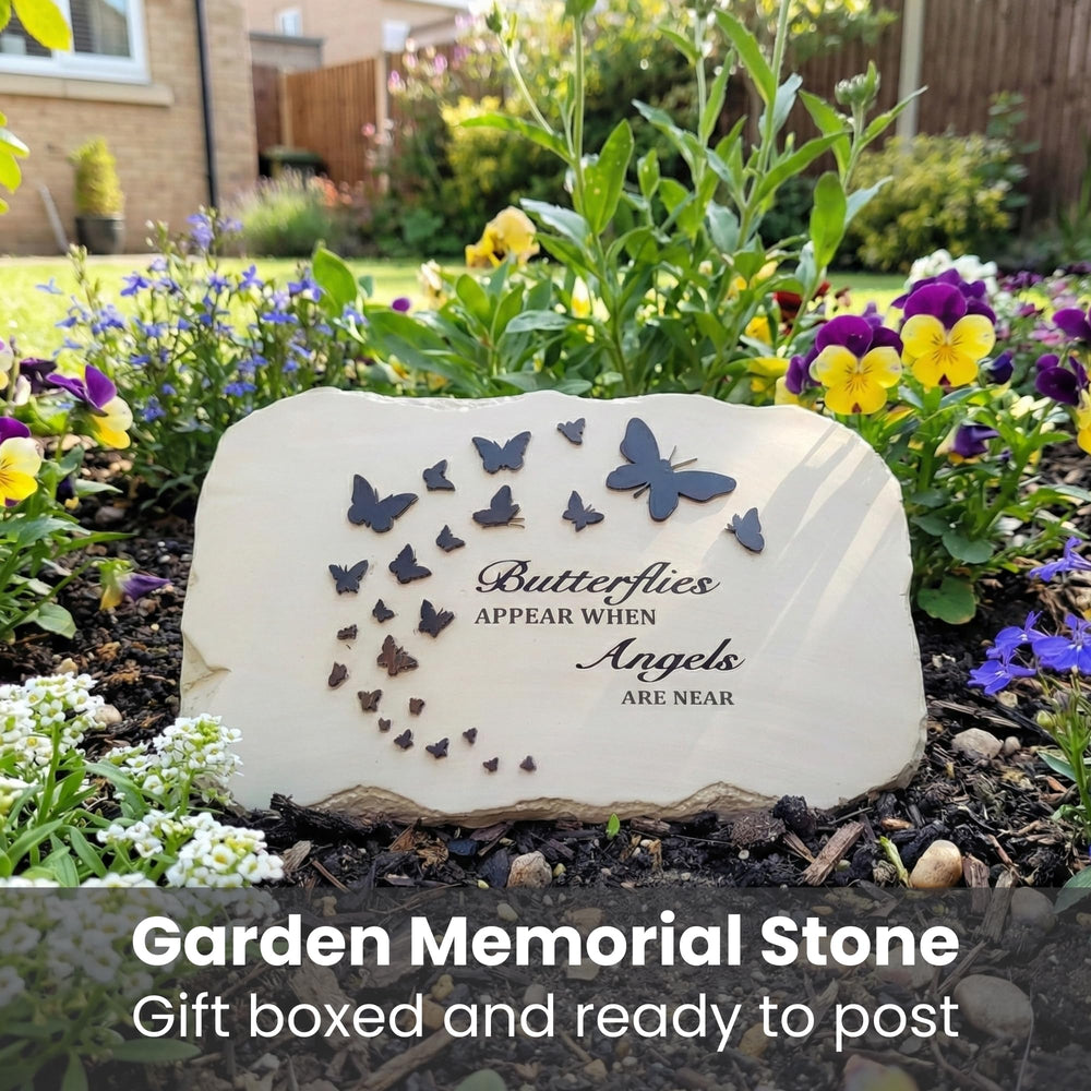 PetAngell placed in garden bed beside flowers, adds serene remembrance to landscape