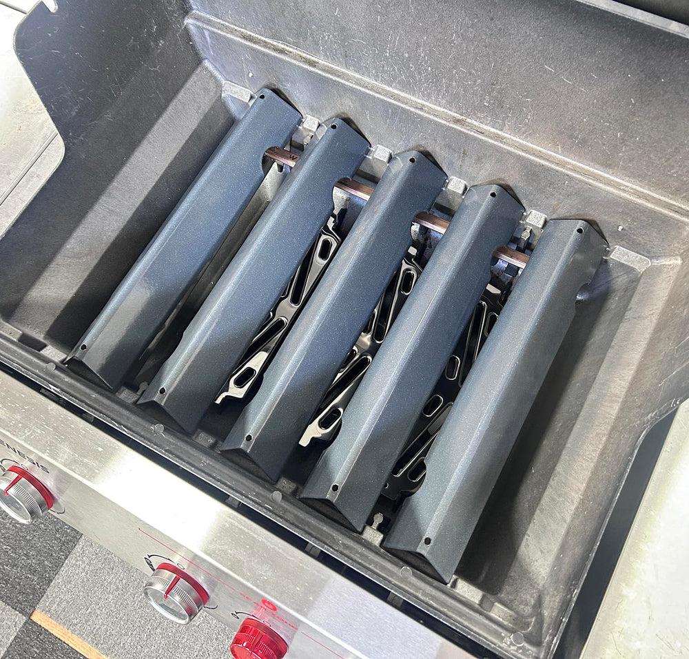 PETKAO heat deflectors placed under burners protecting firebox