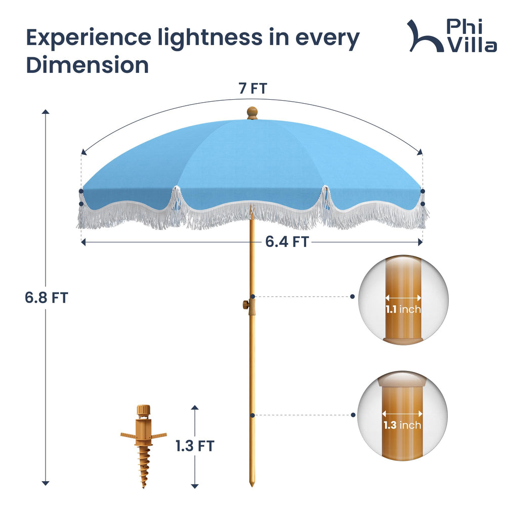 PHI VILLA umbrella next to a beach chair to show size and coverage