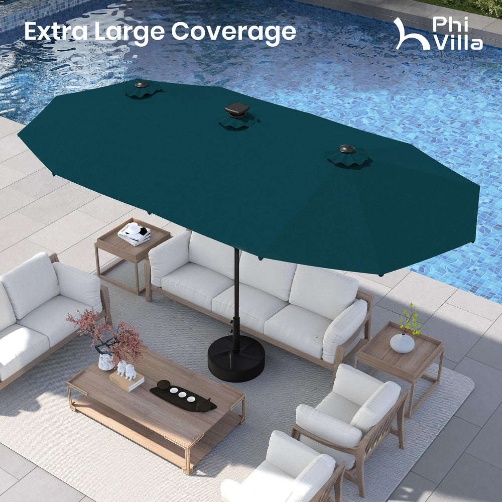 PHI VILLA umbrella beside table showing scale and generous coverage