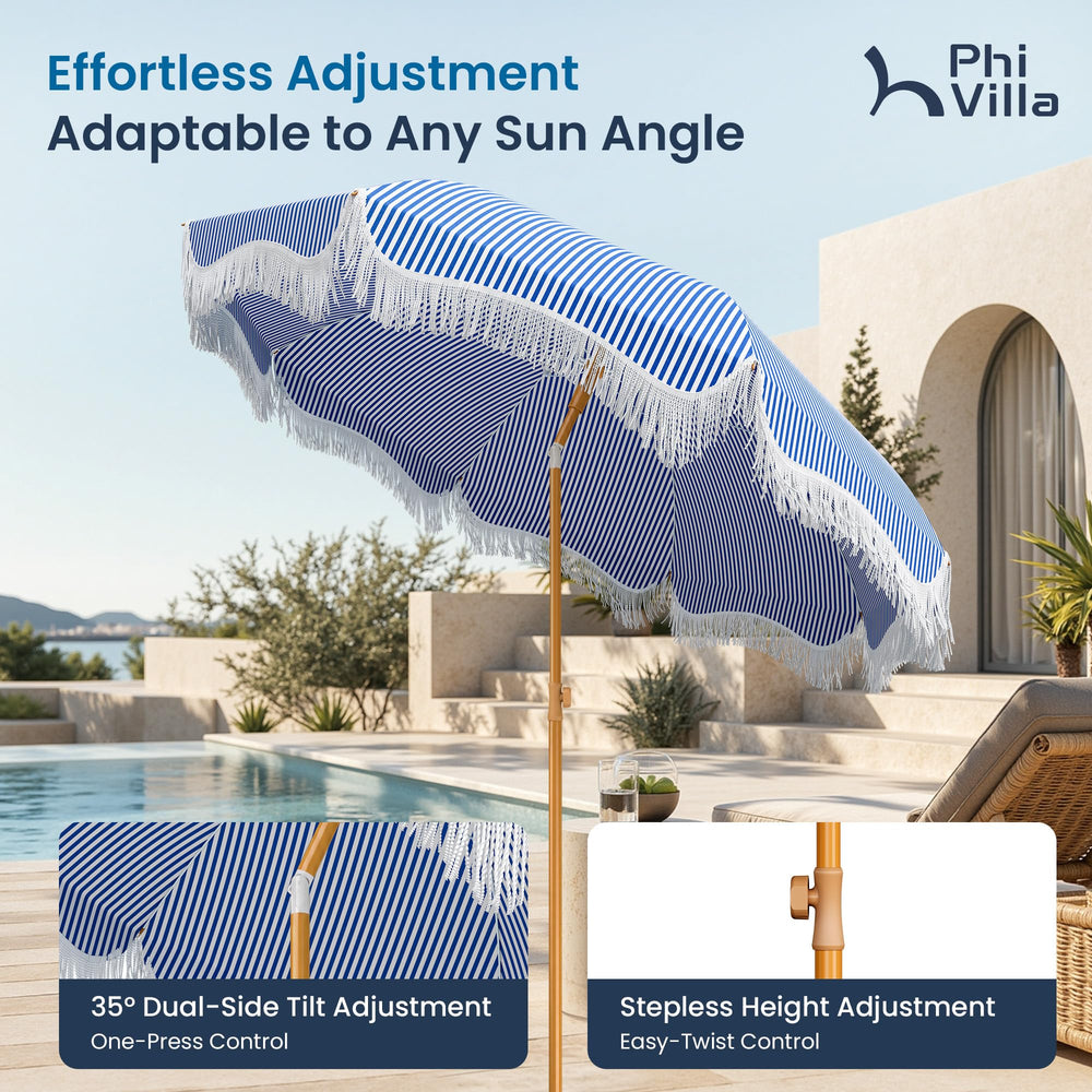 PHI VILLA umbrella in use on sandy beach offering portable shade