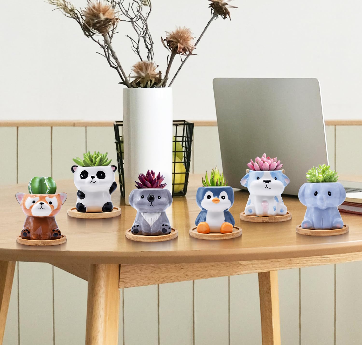 Photken raccoon and elephant styled on a windowsill brightening home decor