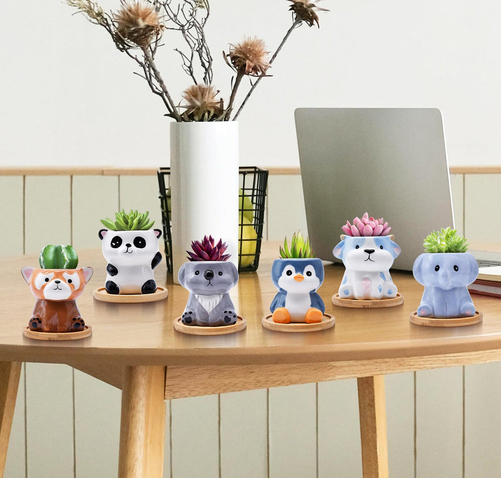 Photken raccoon and elephant styled on a windowsill brightening home decor