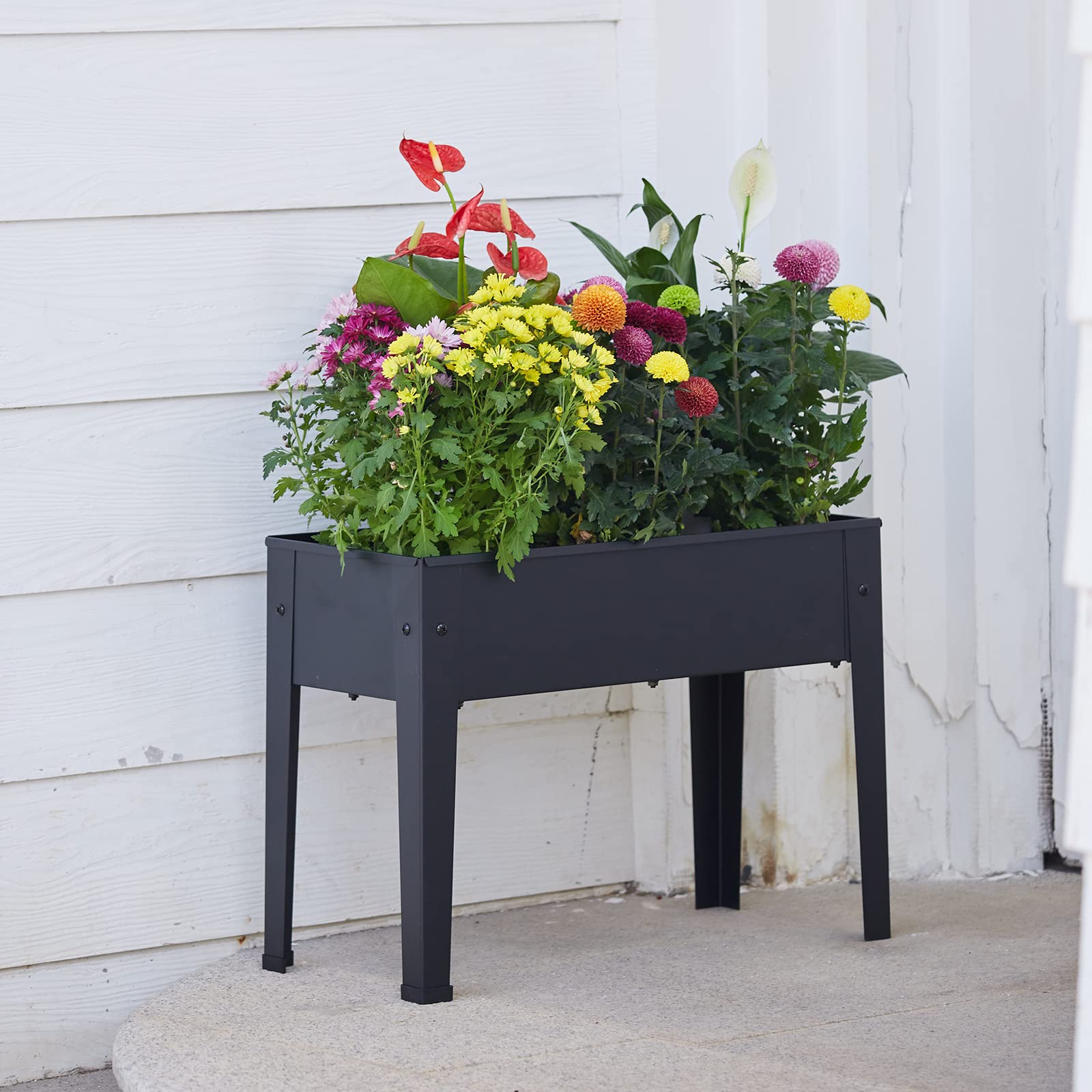 Piksedo size comparison next to chair illustrating space-saving advantage