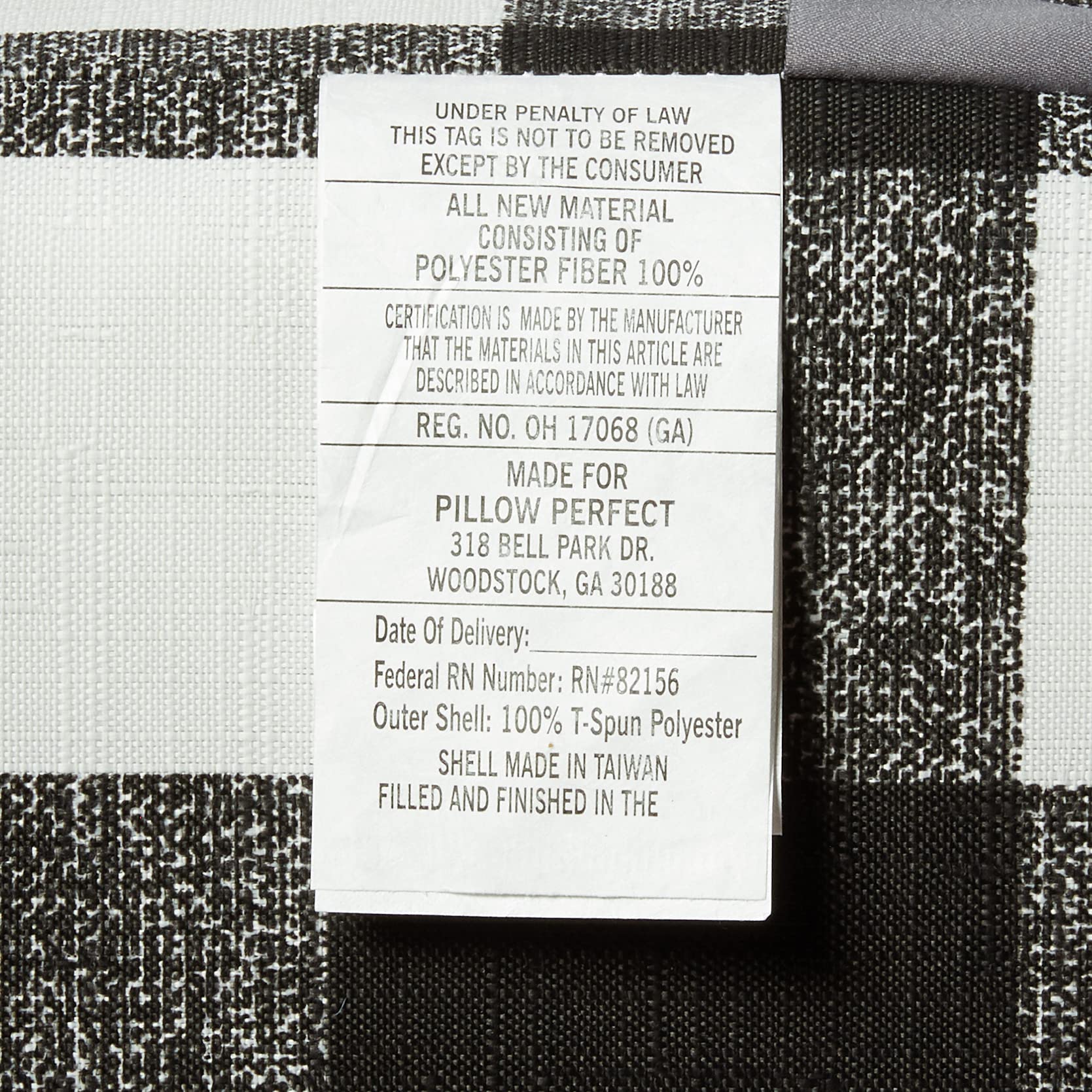 Pillow Perfect cushion beside ruler for size comparison showing accurate 45 by 18-inch fit