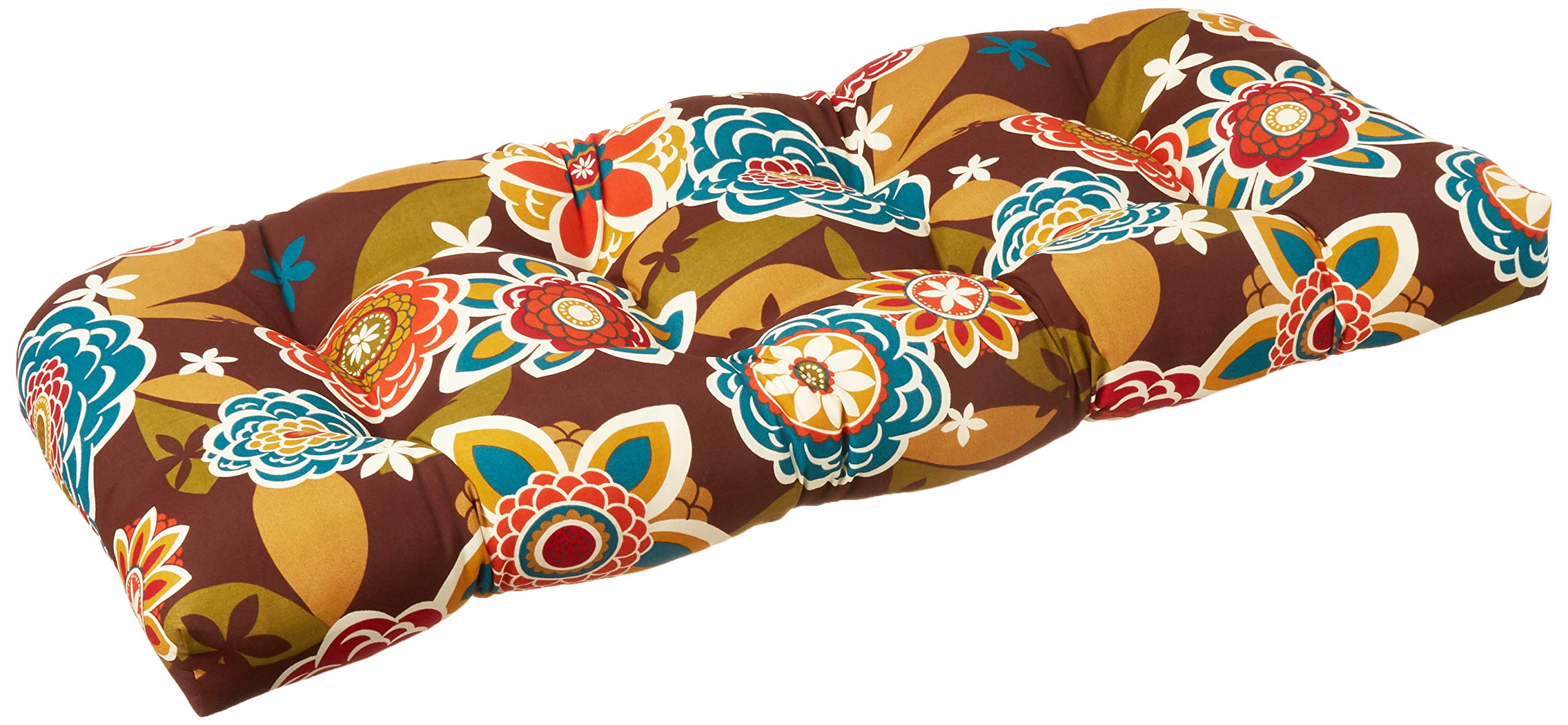 Pillow Perfect Annie placed on wicker loveseat demonstrating comfortable fit benefit