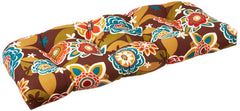 Pillow Perfect Annie placed on wicker loveseat demonstrating comfortable fit benefit