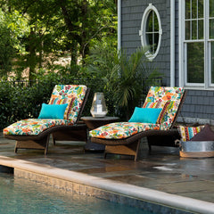 Pillow Perfect chaise cushion on patio showing secured ties and comfortable recycled-polyester fill for lounging