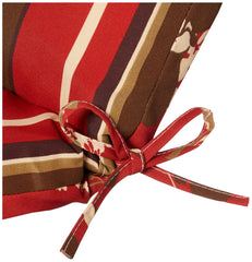 Pillow Perfect cushion arranged on a patio chaise showing tied attachment and comfort