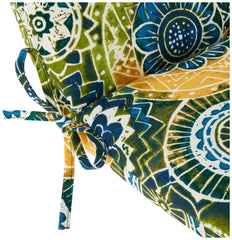 Pillow Perfect Omnia Lagoon on patio chair demonstrating secured ties and outdoor use