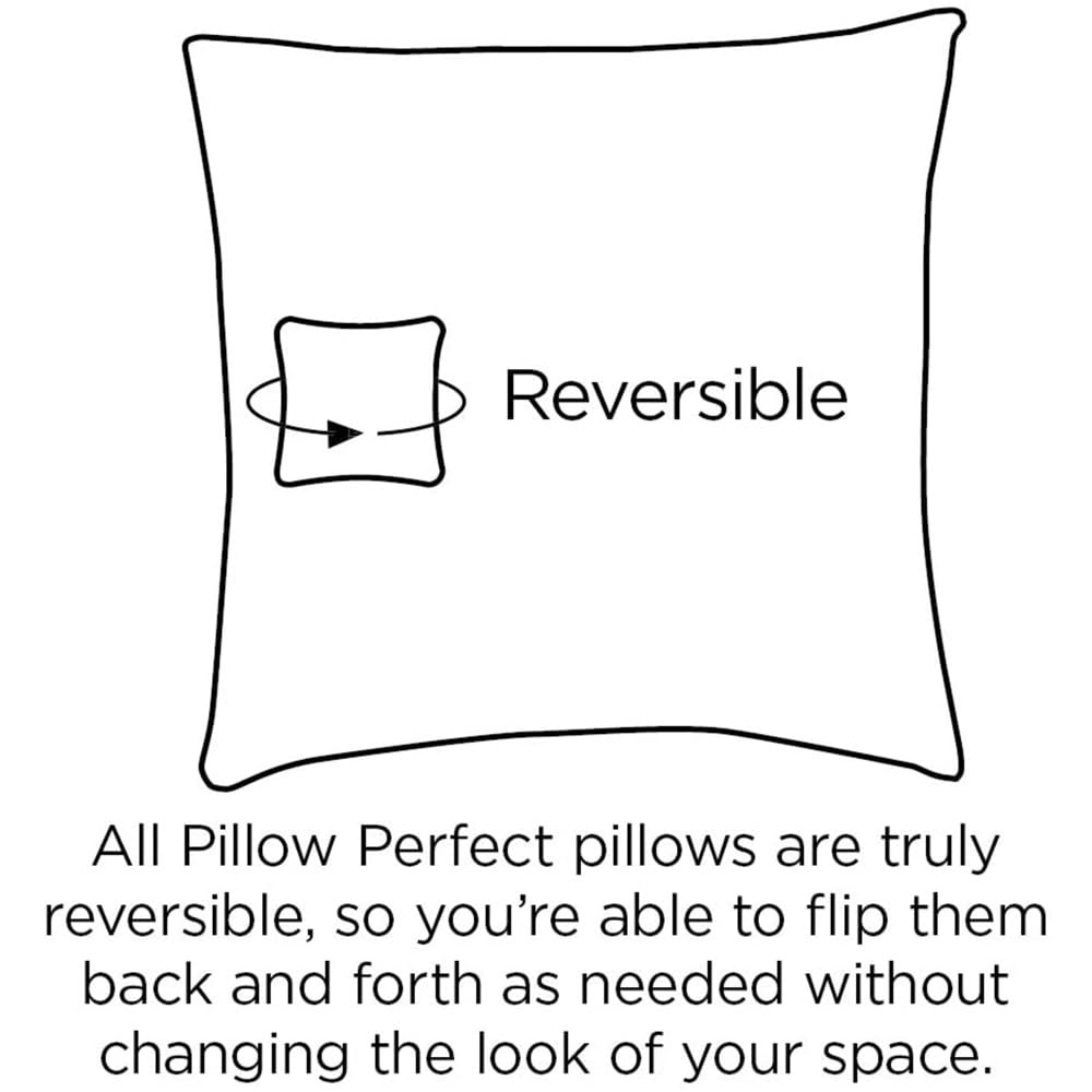 Pillow Perfect cushions styled on a wicker chair in a sunny patio setting for visual appeal