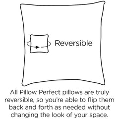 Pillow Perfect pillows styled on patio sofa, adding color and weather resistance