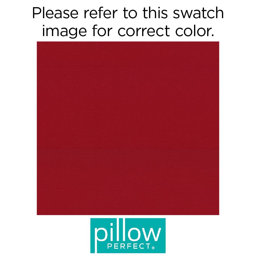 Pillow Perfect cushion held by hand to show true compact size and portable convenience