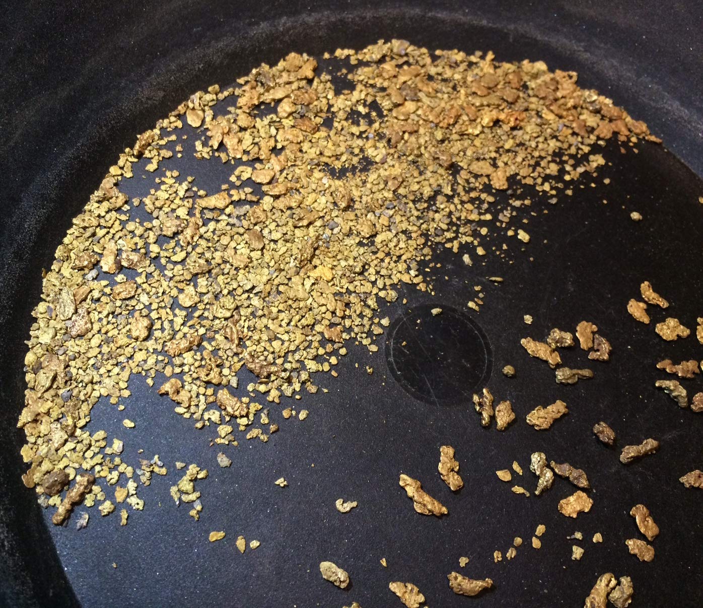 Pioneer Paydirt close-up of gravel and gold flecks, clear mineral detail boosts detection