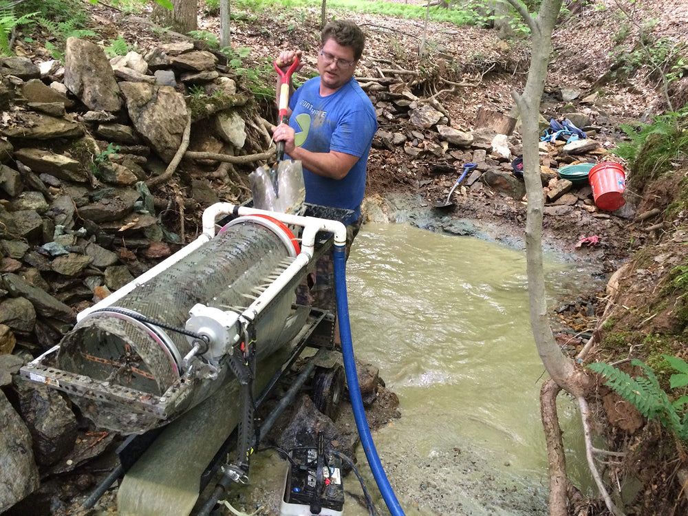 Pioneer Paydirt in a gold pan being washed, Pioneer Paydirt aids easy panning practice