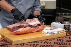 PIT BOSS carving fork and slicing knife in use carving brisket for neat portions