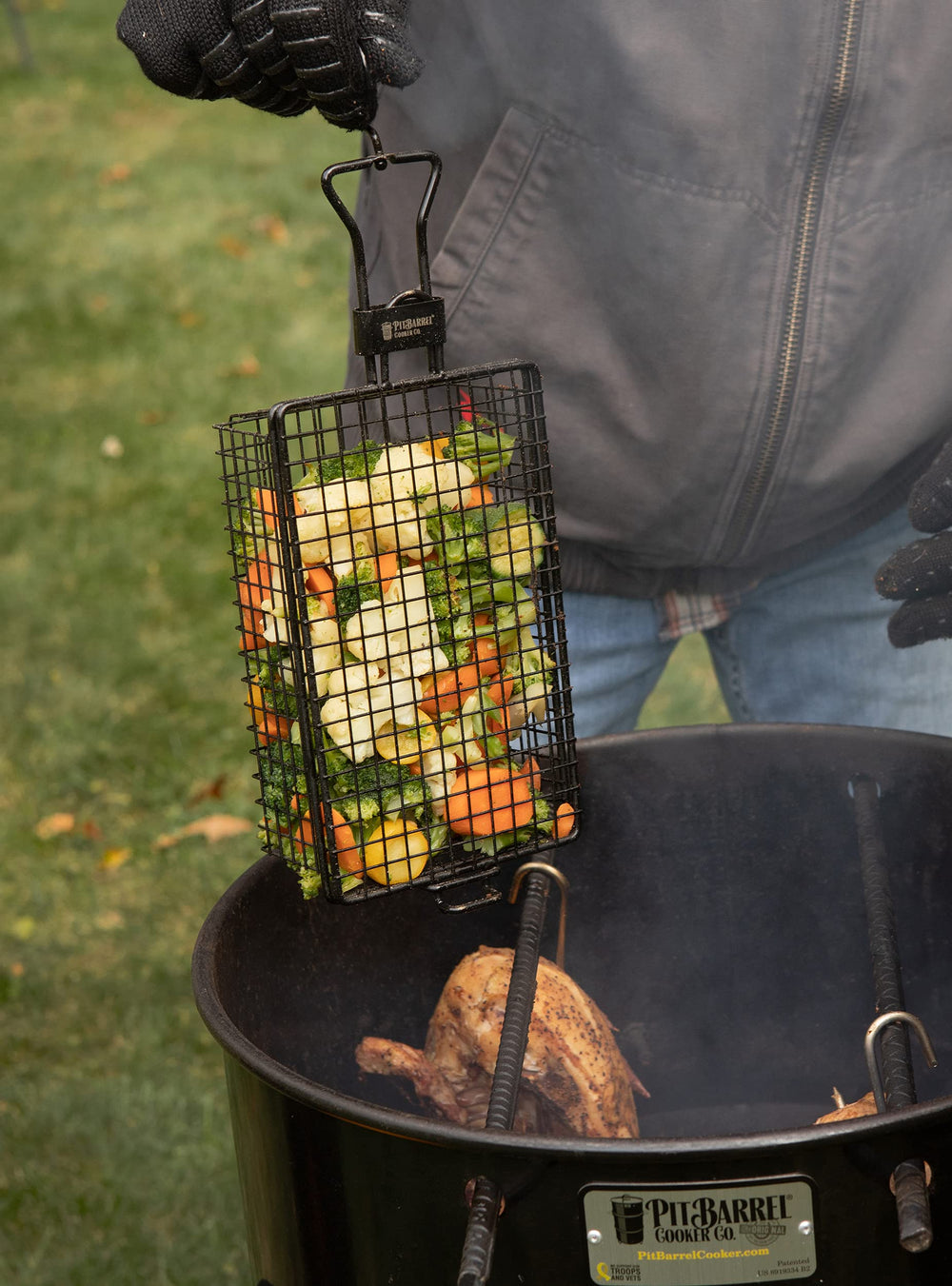 Pit Barrel Cooker Co. corn hanger loaded with cobs delivering even char