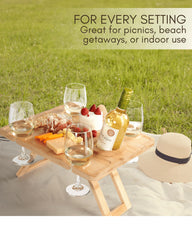 Piticco top view showing wine glasses and snacks on stable bamboo surface