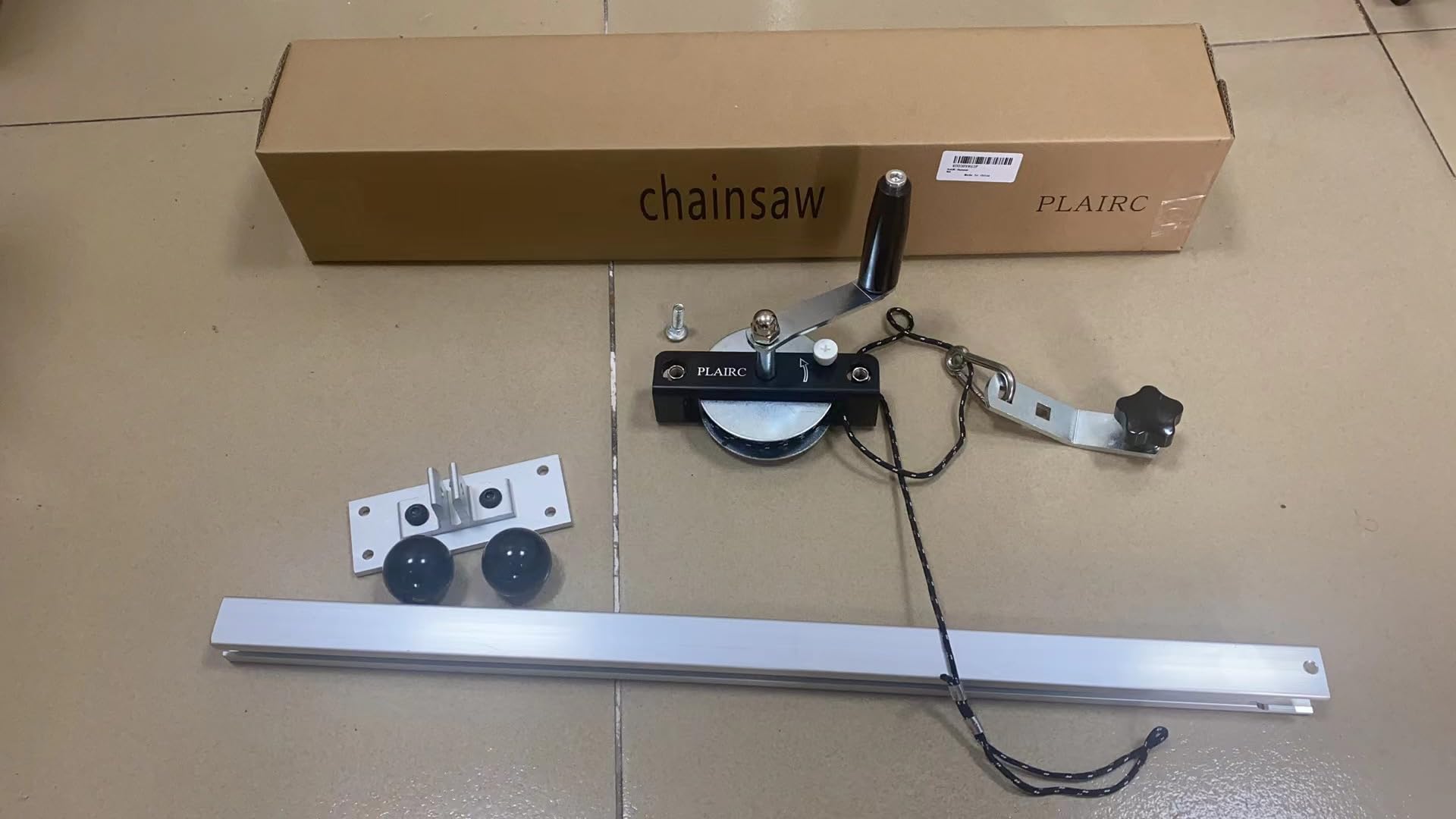 PLAIRC packaging and hardware laid out showing included bolts and installation guide