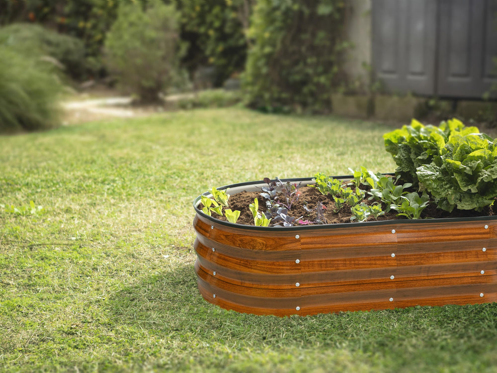 Plant & Plot raised bed on patio with pots illustrating stylish dark wood grain finish