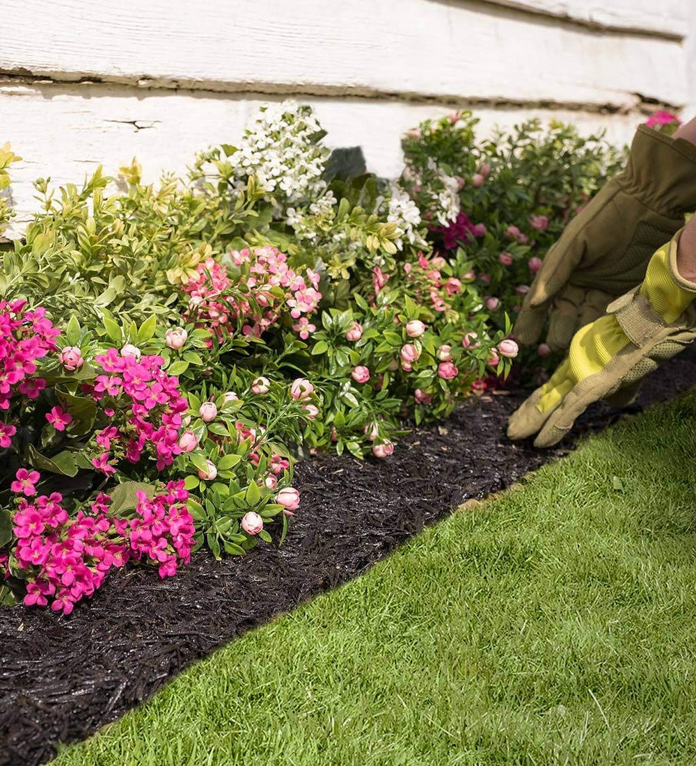 Plow & Hearth installed along a flower bed illustrating tidy landscape aesthetic benefit