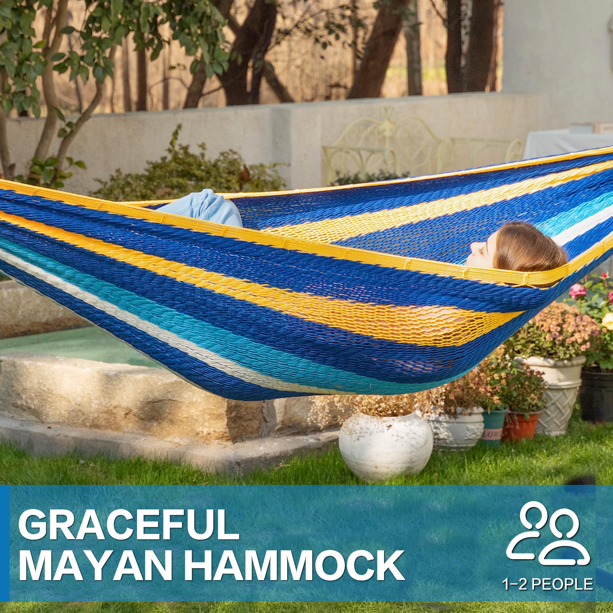 PNAEUT hammock hung in backyard with person relaxing, demonstrating sturdy support