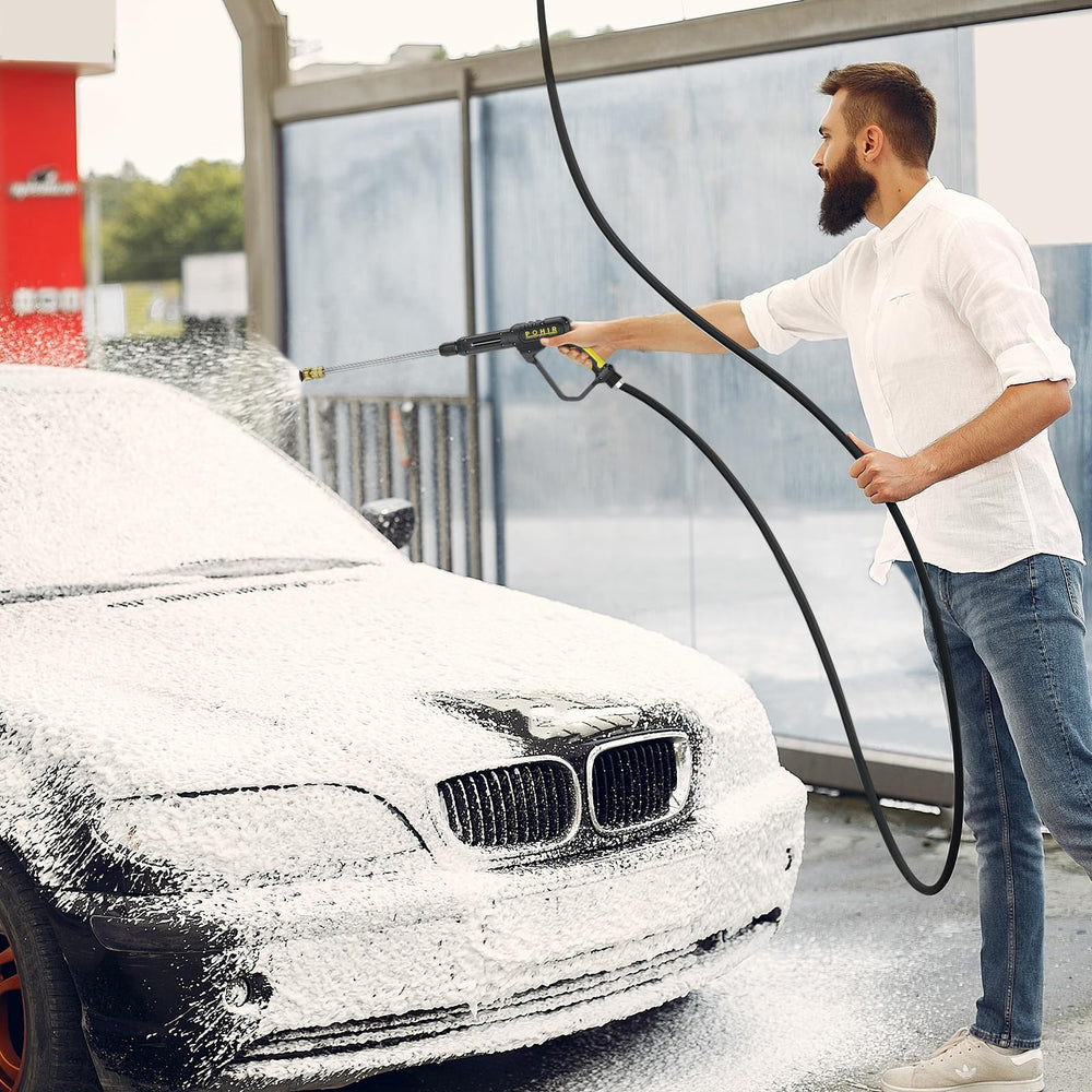 POHIR pressure washer kit in use cleaning a driveway to show effective outdoor grime removal