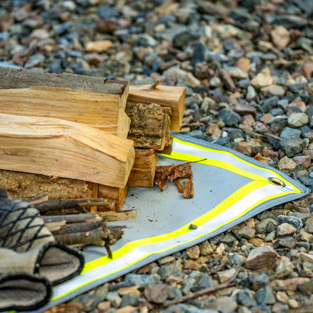 POMOLY mat beneath a grill on a wooden deck reducing heat transfer and damage