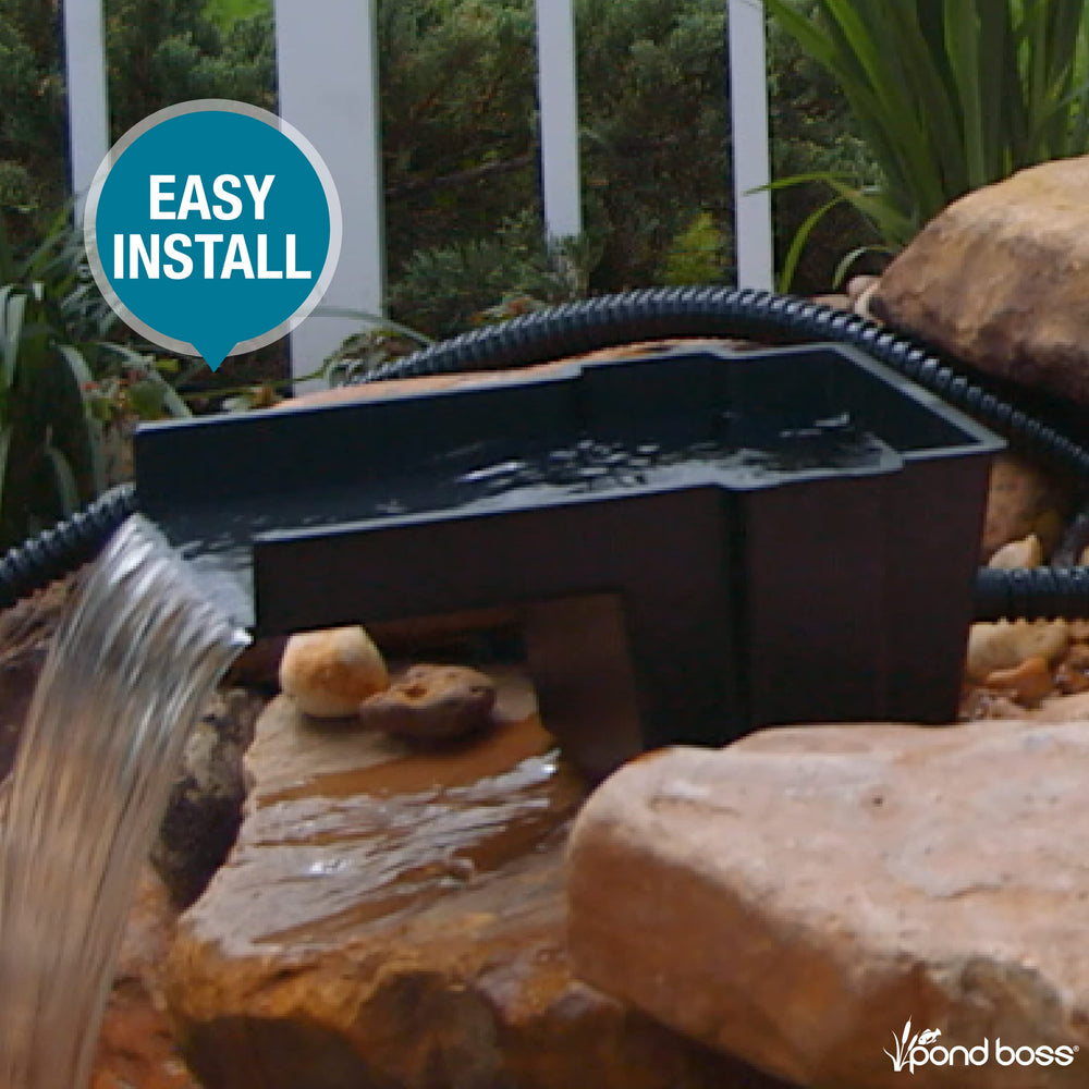 POND BOSS in garden waterfall setting creating soothing sound and visual appeal