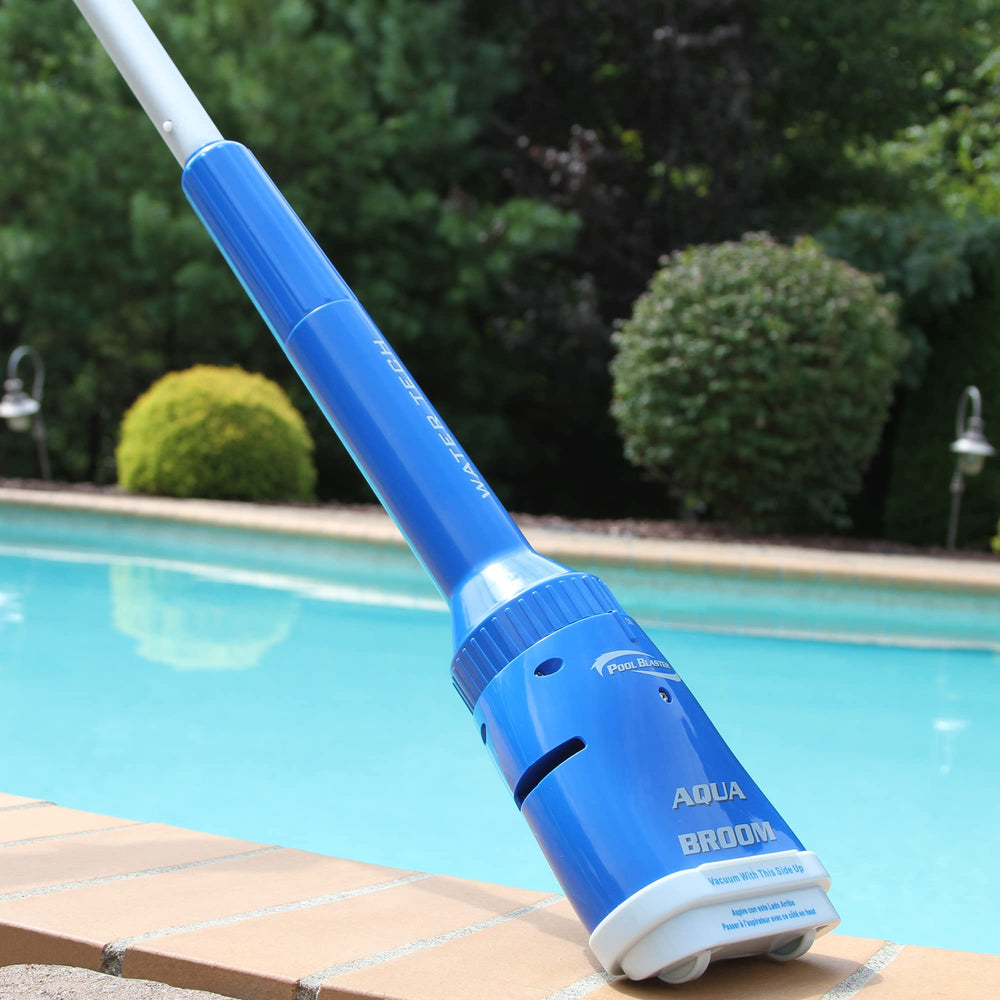 POOL BLASTER in use handheld on hot tub floor removing sand and improving clarity