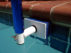 POOL BLASTER two‑inch replacement pad closeup showing texture and soap hole for even tile pressure