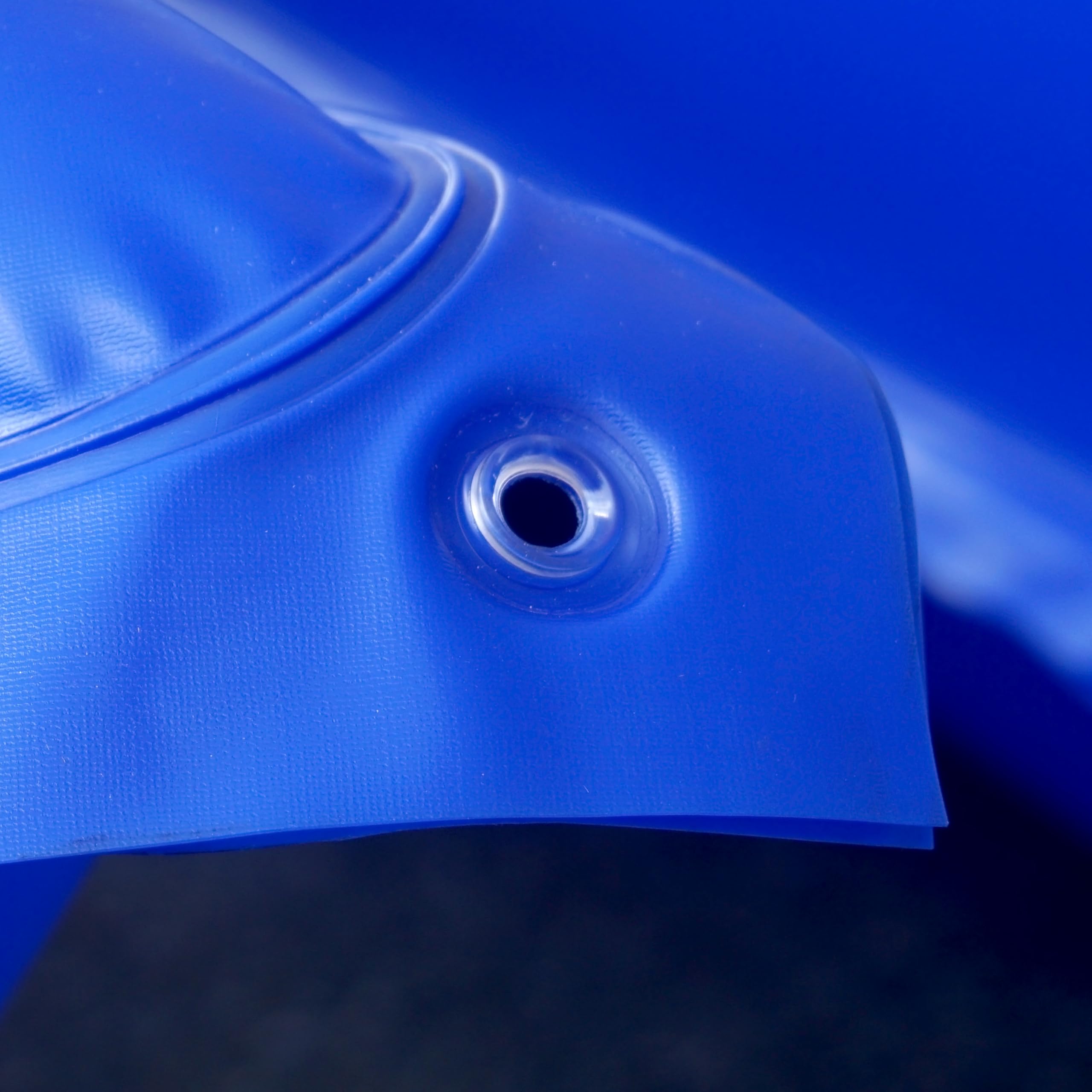 Pool Mate pillow placed under winter pool cover lifting center to prevent water pooling