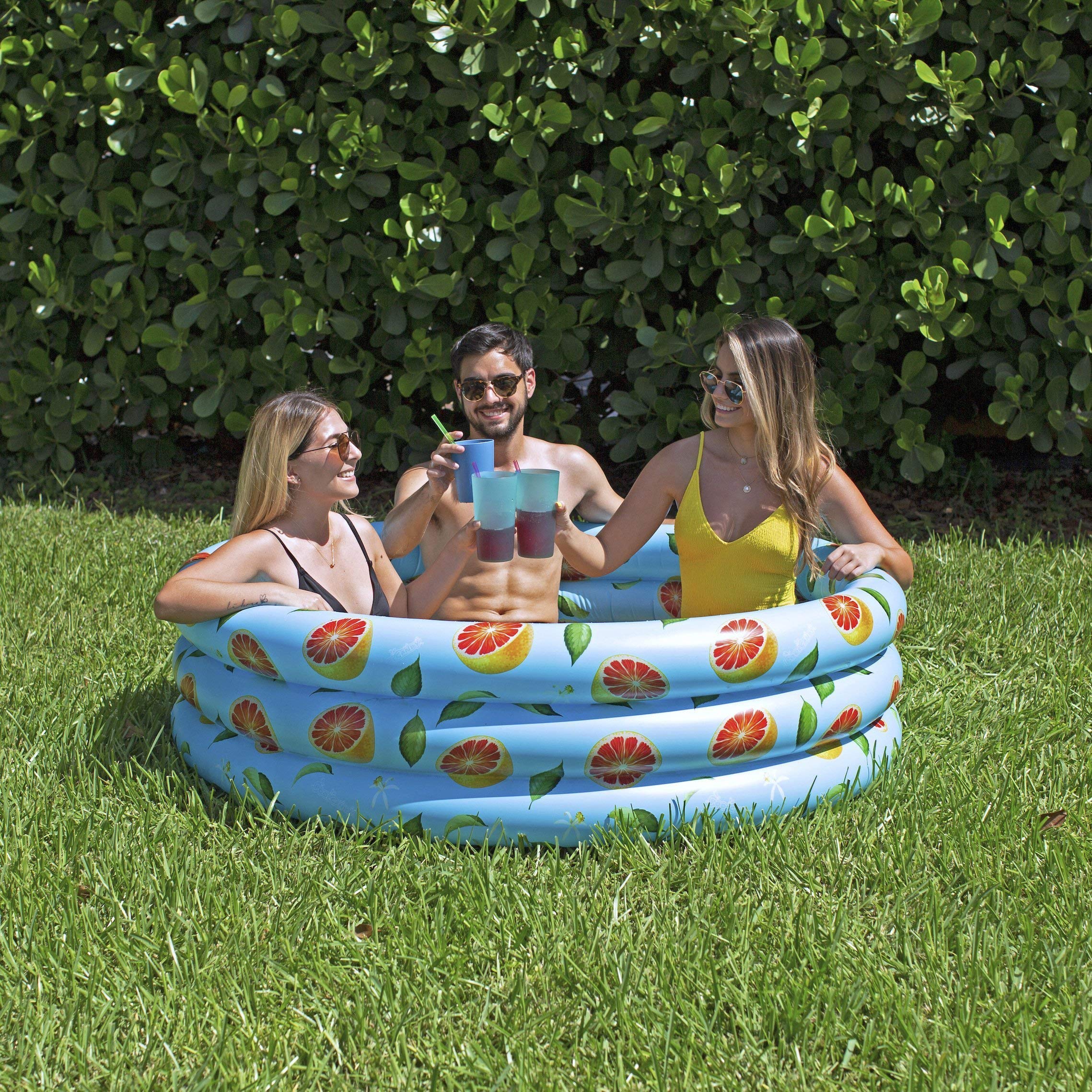 Poolcandy next to a chair for scale, demonstrating room for up to three adults