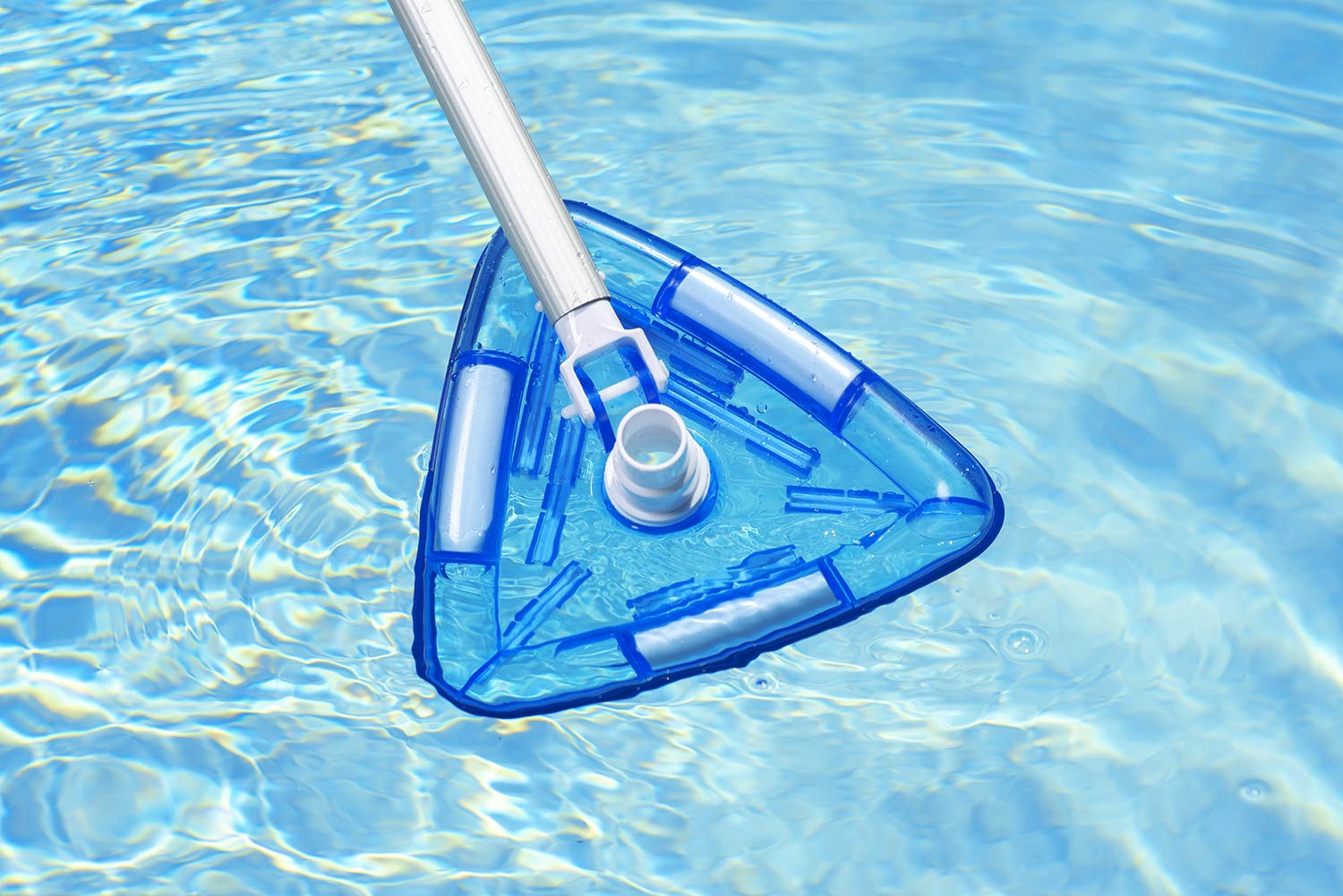 Poolmaster replaceable channel-set brushes cleaning debris efficiently