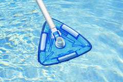 Poolmaster replaceable channel-set brushes cleaning debris efficiently