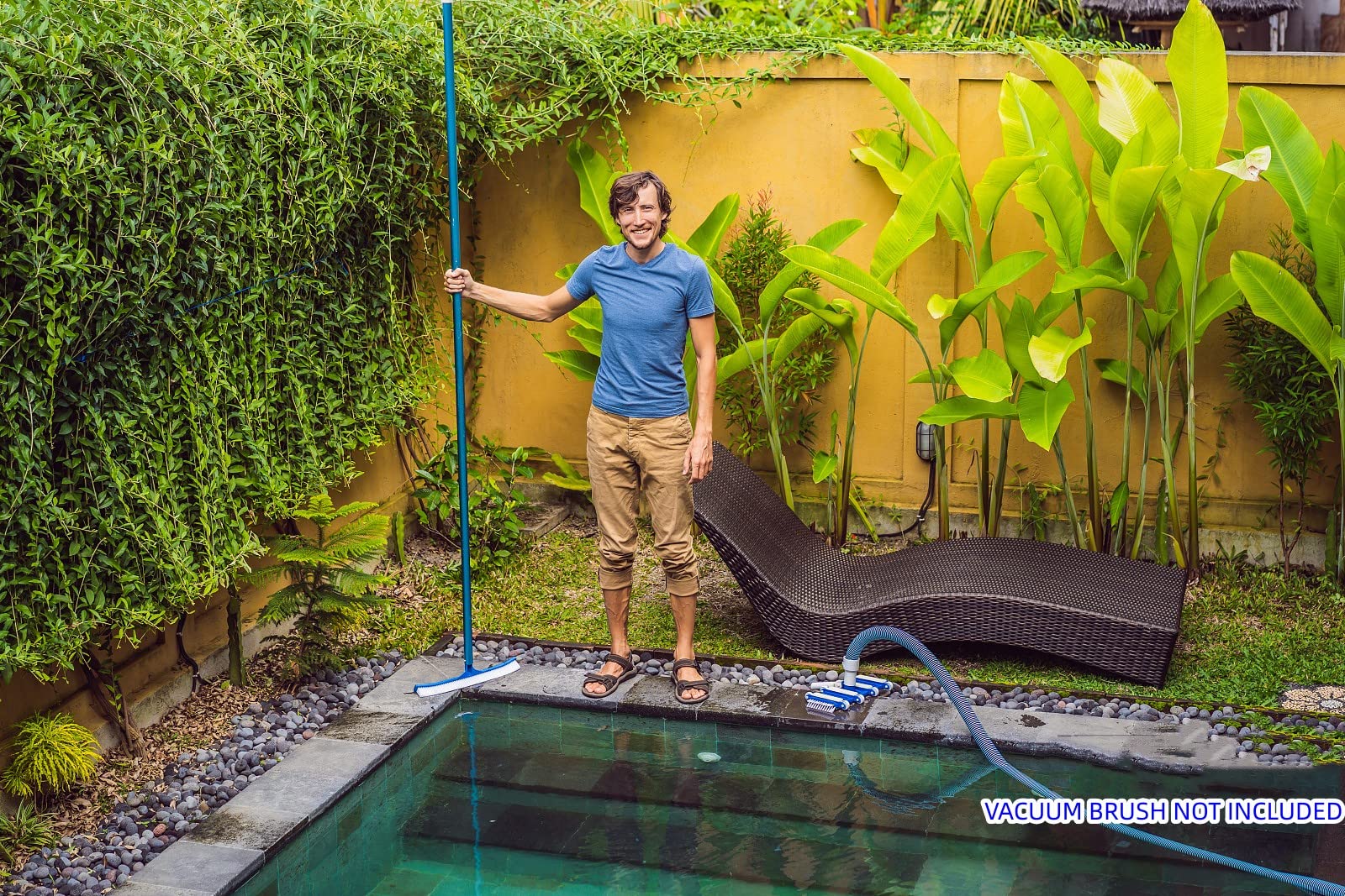 POOLWHALE pole with attached net removing leaves demonstrating efficient debris removal