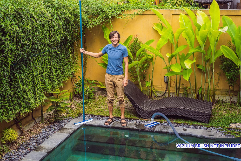 POOLWHALE pole with attached net removing leaves demonstrating efficient debris removal