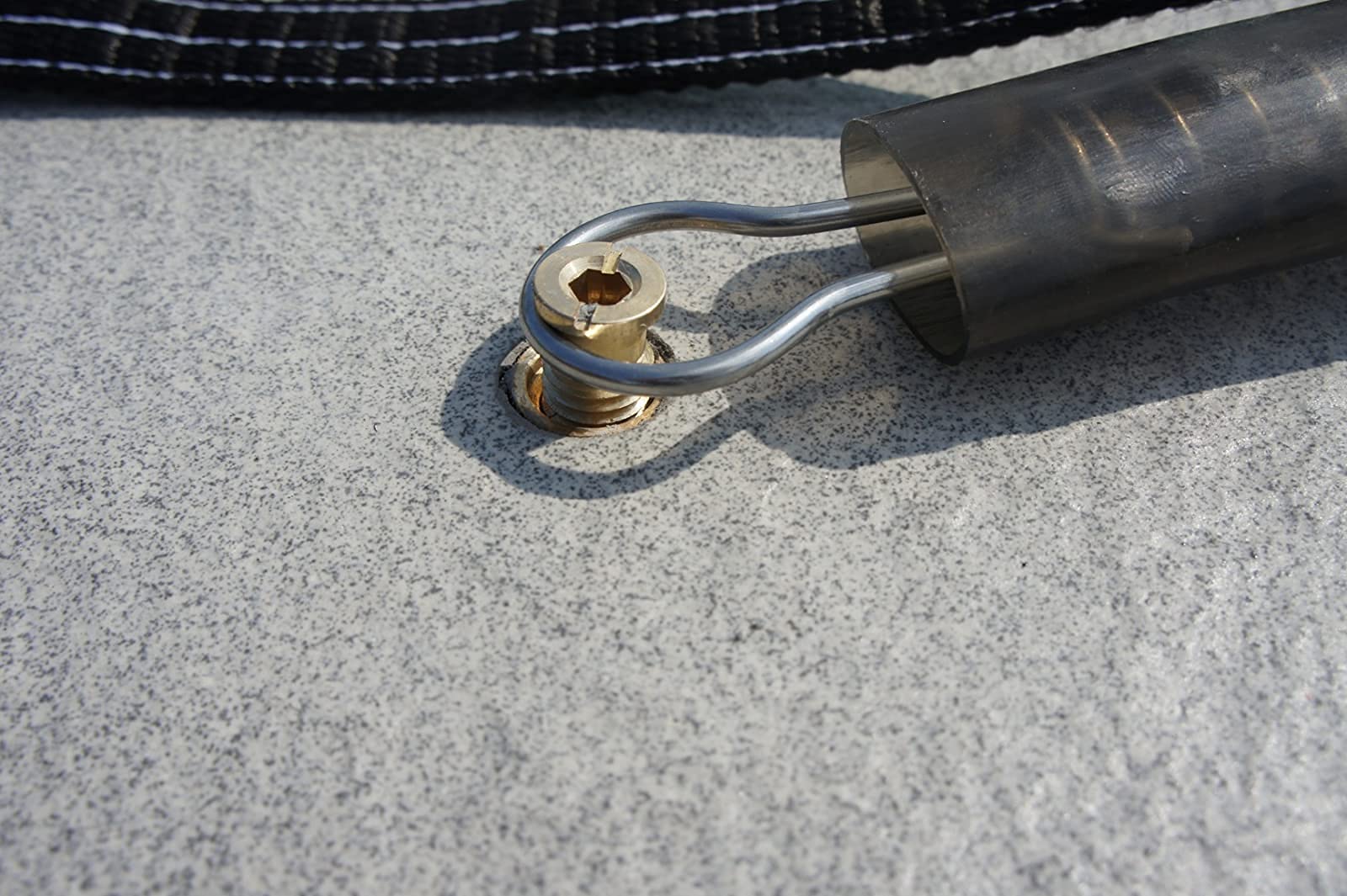 Poolzilla removable insert and screw close-up showing easy replacement capability