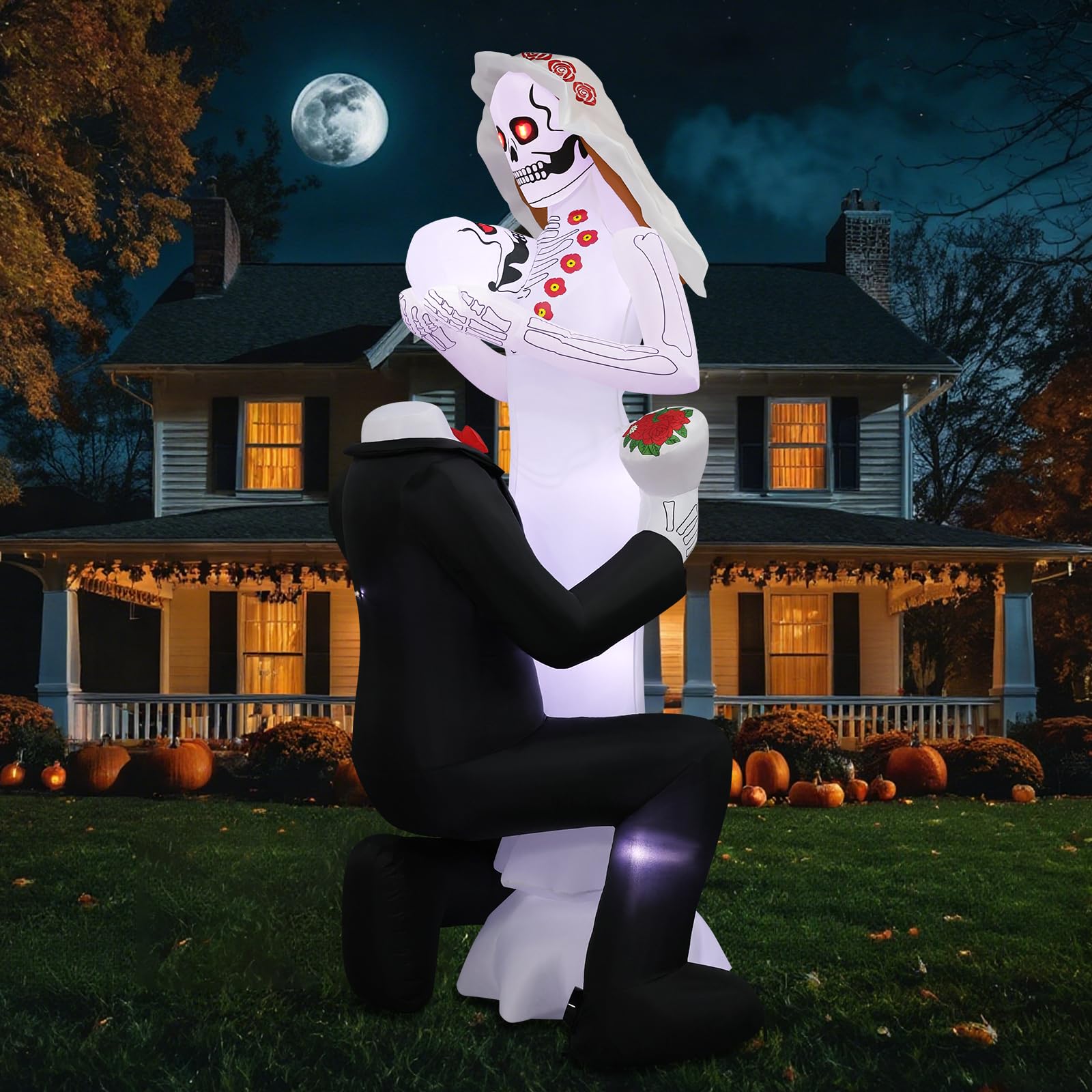 PopInflate front view of 8ft skeleton couple lighting yard entrance with drama