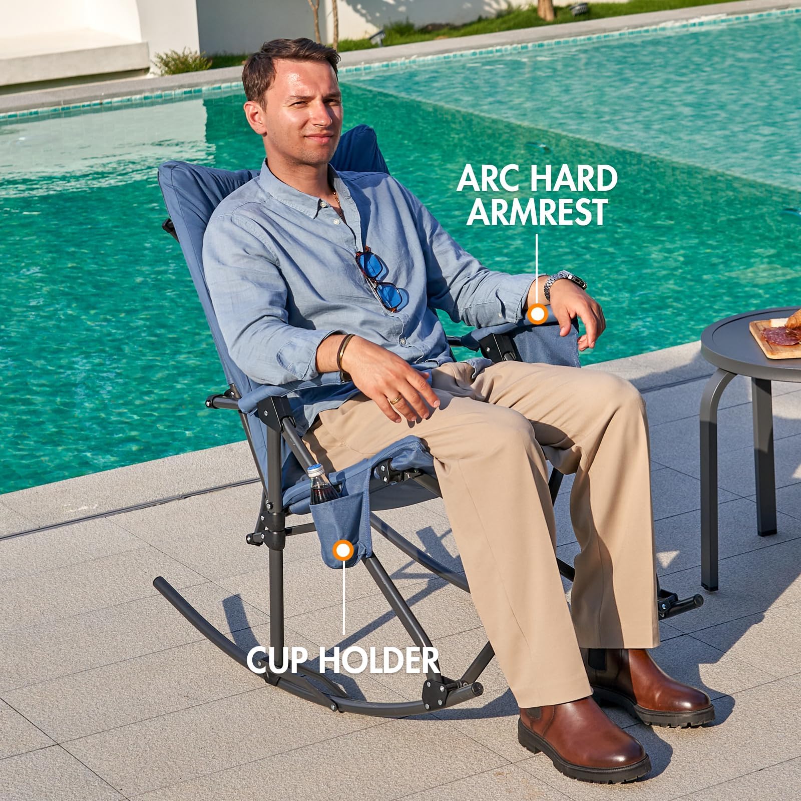 Portal chair on patio with cup and book showing relaxed outdoor use